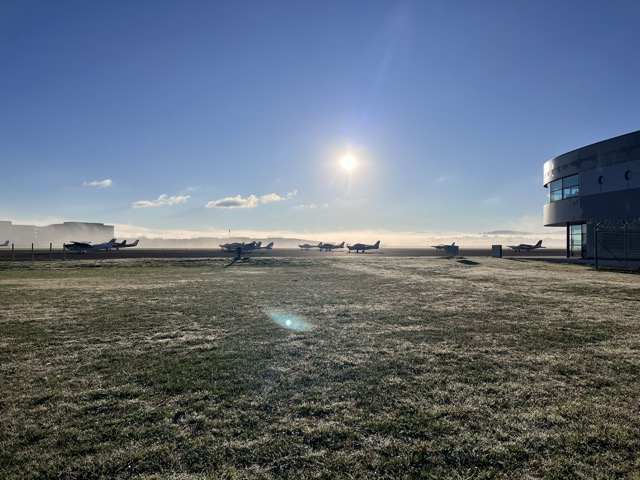 Light aircraft parked at the airport.